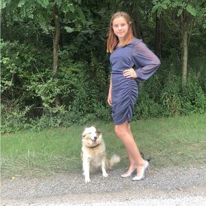 This is a gray one shoulder teezeme dress.